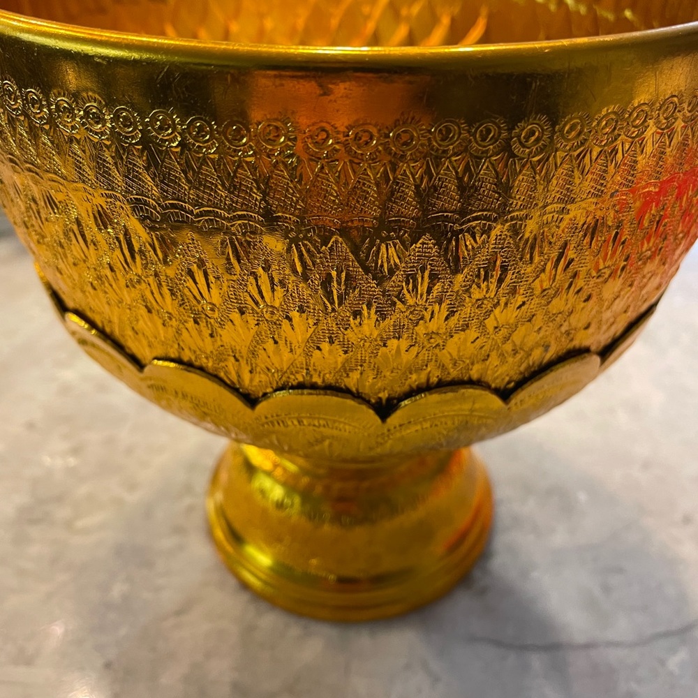 Thai gold metal monks offering bowl